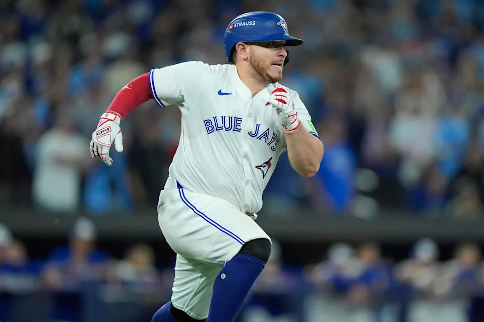 Toronto Blue Jays catcher Alejandro Kirk runs after hitting a single in Game 7 of the World Series against the Los Angeles Dodgers on Nov. 1 at Rogers Centre in Toronton. -- John E. Sokolowski/Imagn Images.