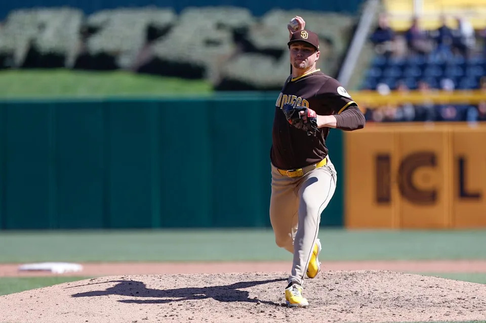 Mason Miller #22 throws a pitch against the Pirates at PNC Park on April 8, 2025 in Pittsburgh.