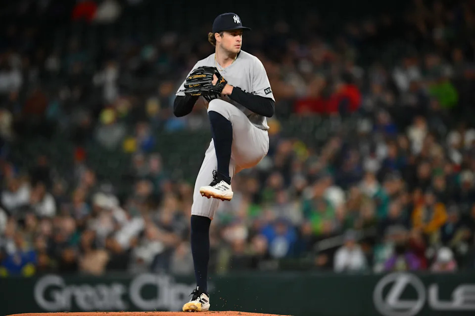 Apr 1, 2026; Seattle, Washington, USA; New York Yankees starting pitcher Cam Schlittler (31) pitches to the Seattle Mariners during the first inning at T-Mobile Park. Mandatory Credit: Steven Bisig-Imagn Images