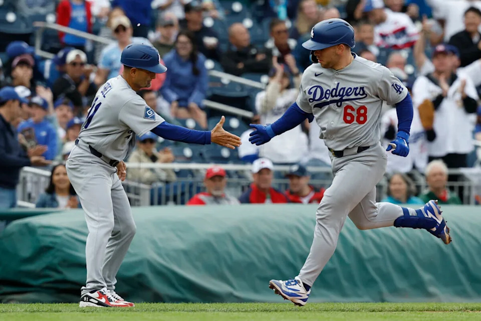 Apr 5, 2026; Washington, District of Columbia, USA; Los Angeles Dodgers catcher Dalton Rushing (68) celebrates with Dodgers third base coach/outfield coach Dino Ebel (91) while rounding the bases after hitting a two run home run against the Washington Nationals during the sixth inning at Nationals Park. Mandatory Credit: Geoff Burke-Imagn Images