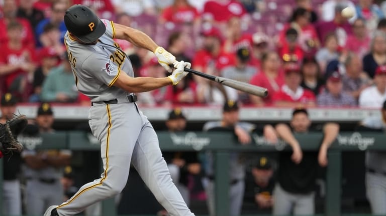 Pittsburgh Pirates' Bryan Reynolds hits a solo home run during...