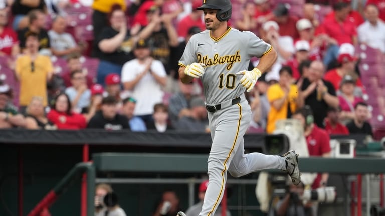 Pittsburgh Pirates' Bryan Reynolds celebrates a solo home run while...