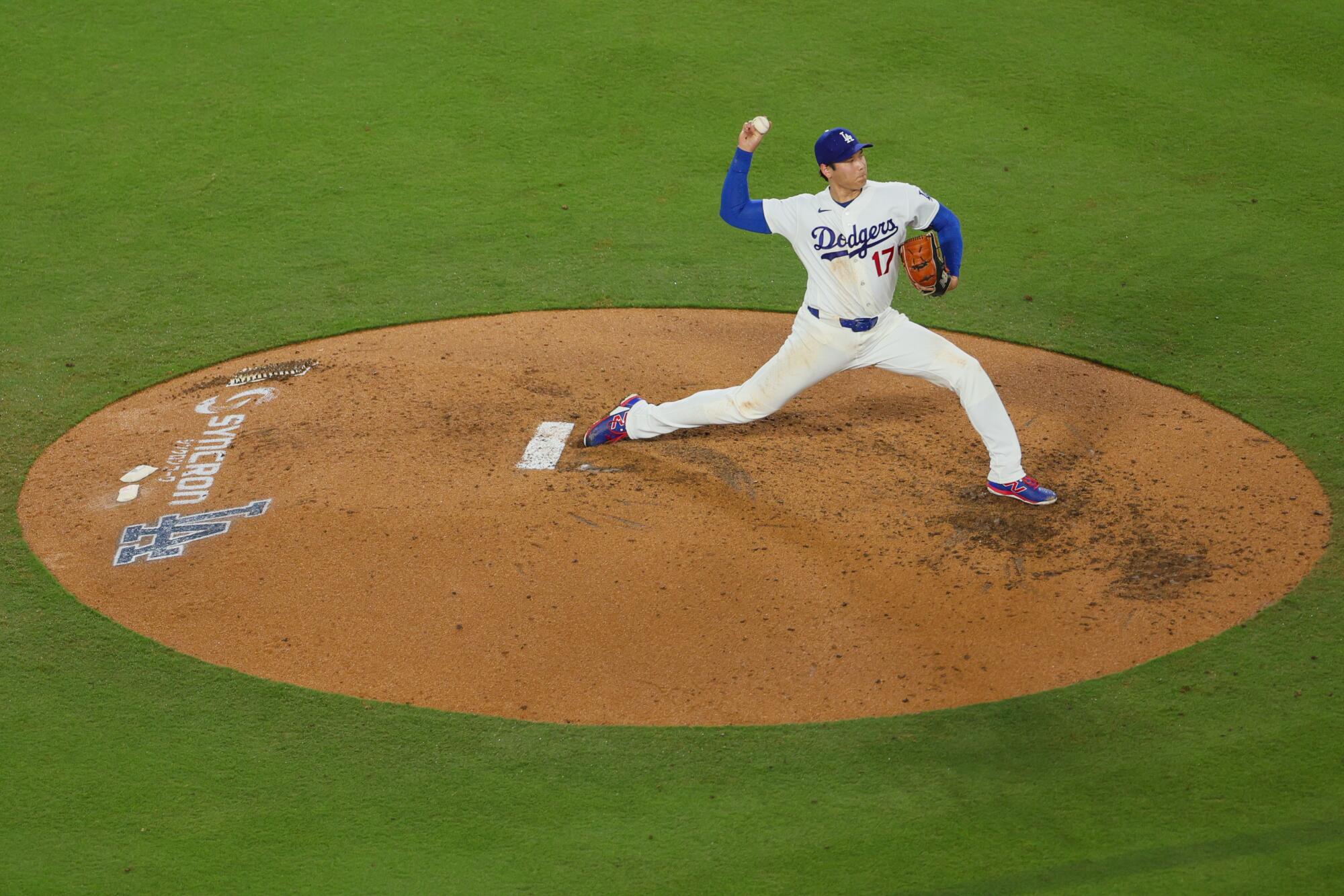 Dodgers pitcher Shohei Ohtani delivers in the fourth inning Tuesday against the Guardians.