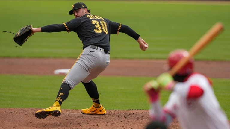 Pittsburgh Pirates pitcher Paul Skenes throws during the first inning...