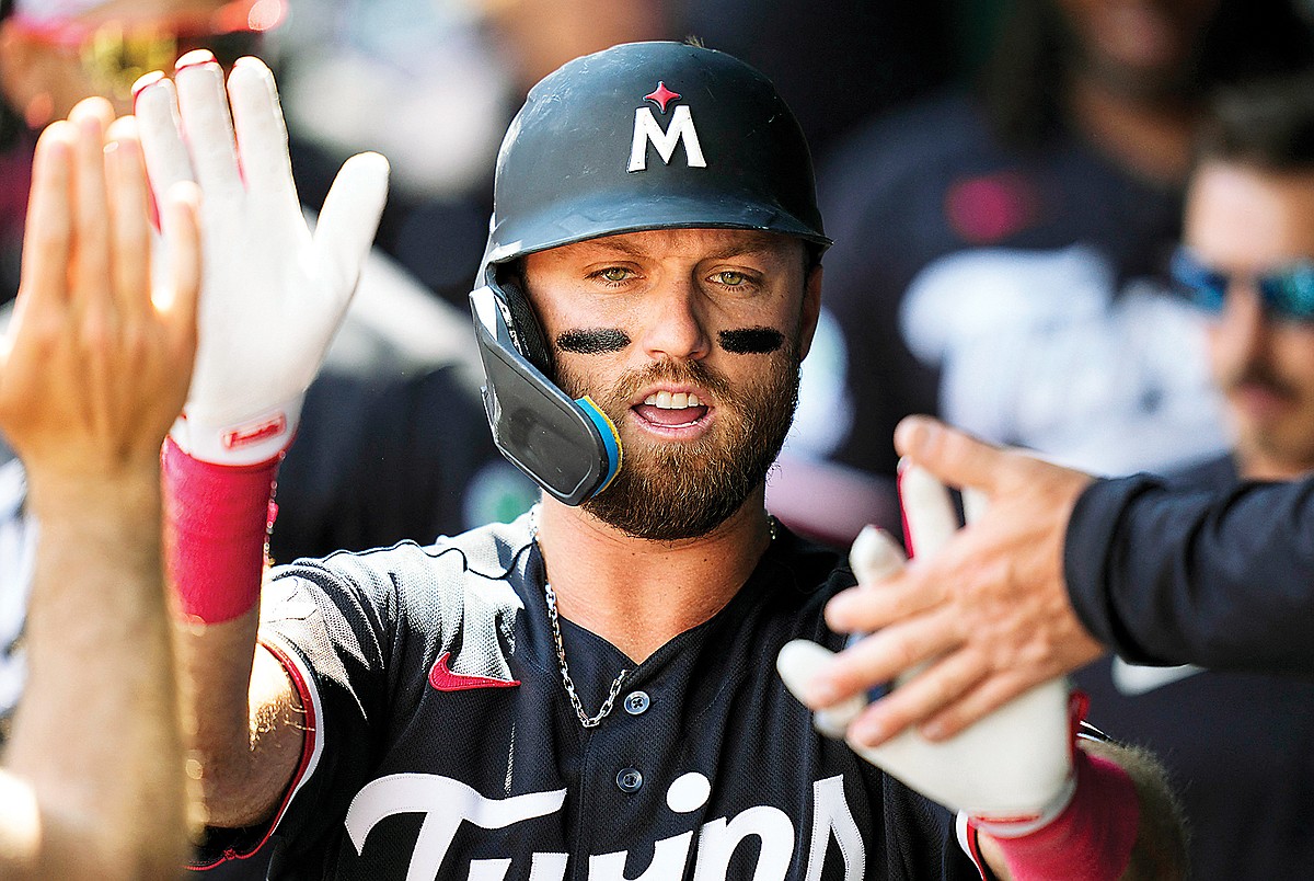 Late homers help Twins end losing skid against Royals