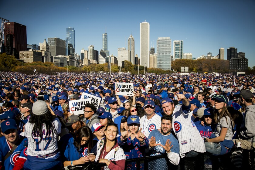 Fans celebrate at the Chicago Cubs World Series rally in Grant Park, Friday morning, Nov. 4, 2016. | Ashlee Rezin/Sun-Times