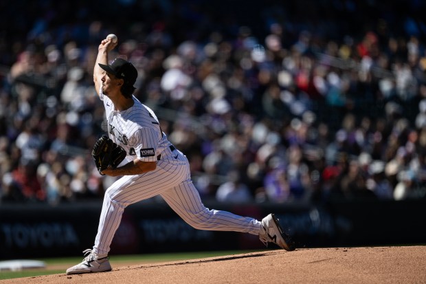 Michael Lorenzen (24) of the Colorado Rockies pitches in the first inning during the Rockies' season home opener against the Philadelphia Phillies on Friday, April 3, 2026, at Coors Field in Denver. (Photo by Timothy Hurst/The Denver Post)