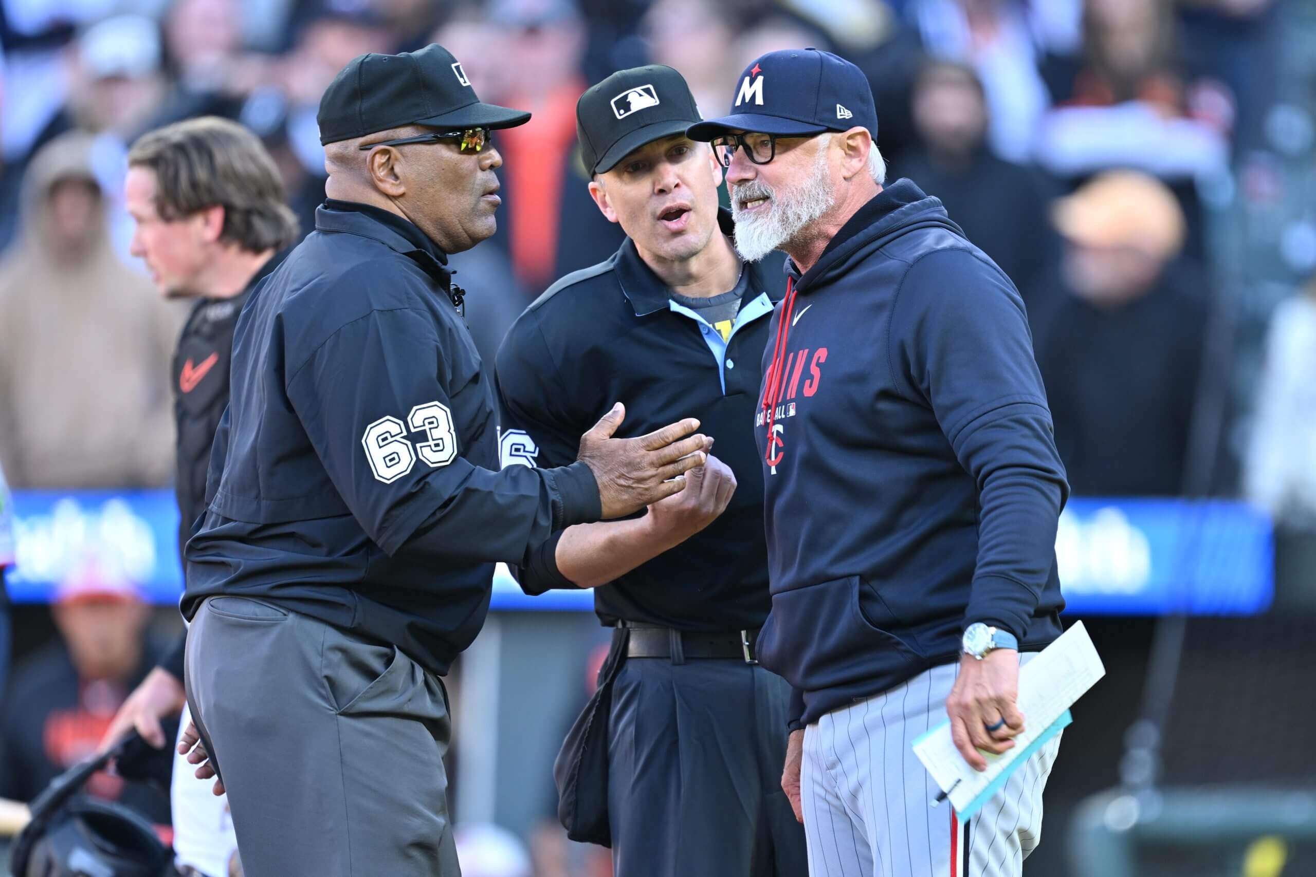 Manager Derek Shelton of the Minnesota Twins discusses a call with umpires.