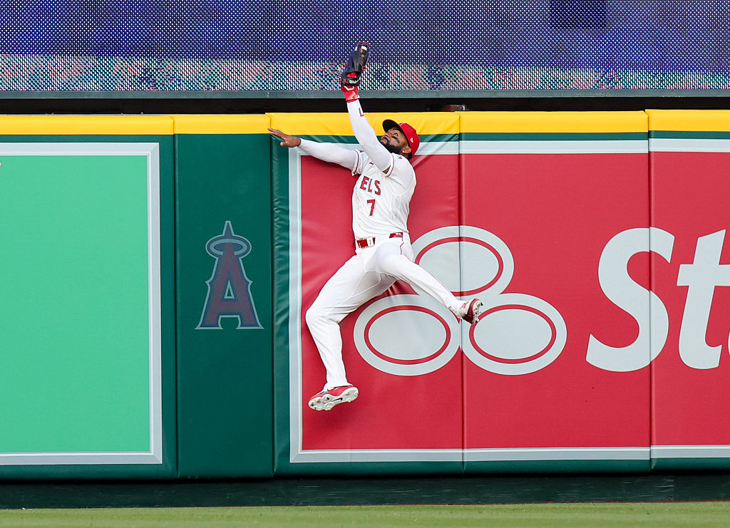 ANAHEIM, CALIFORNIA - APRIL 04: Jo Adell #7 of the Los Angeles Angels catches a fly ball hit by Cal Raleigh #29 of the Seattle Mariners during the first inning of the baseball game at Angel Stadium of Anaheim on April 04, 2026 in Anaheim, California. (Photo by Ryan Sirius Sun/Getty Images)