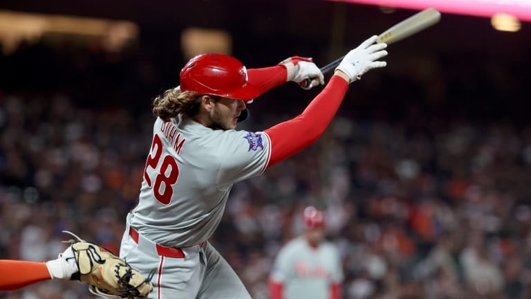 Philadelphia Phillies' Alec Bohm (28) watches his RBI double against...