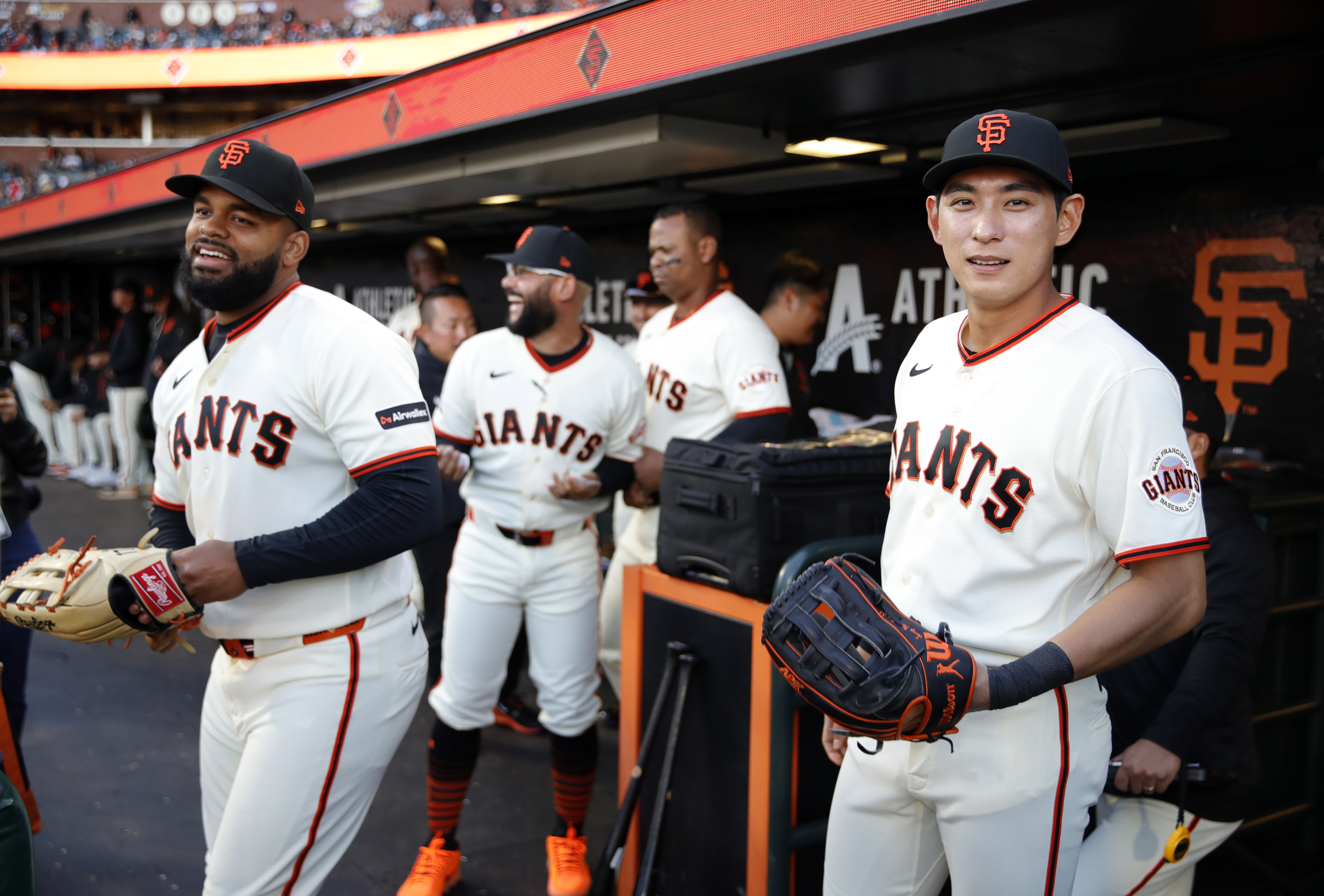 San Francisco Giants’ Jung Hoo Lee #51 and Heliot Ramos...