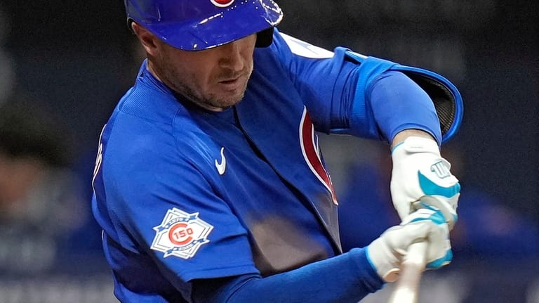 Chicago Cubs' Alex Bregman connects for a single off Tampa...