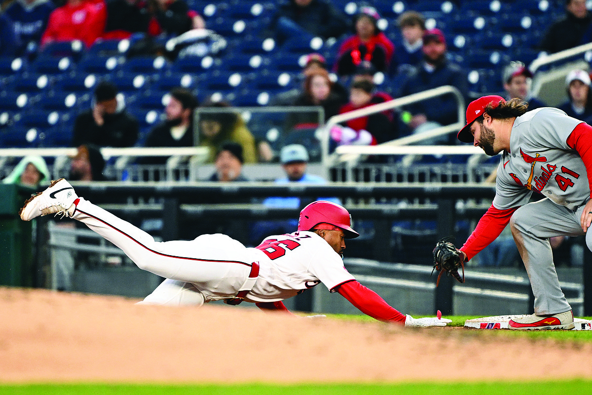 Late rally lifts Cardinals to 10-inning win against Nationals