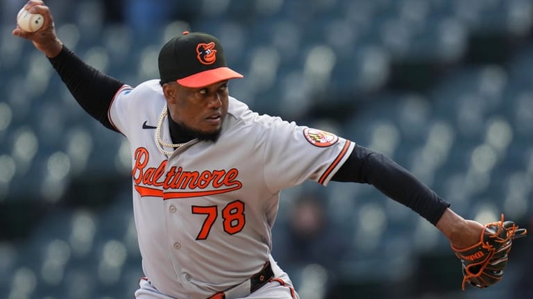 Baltimore Orioles pitcher Yennier Cano (78) throws against the Chicago...