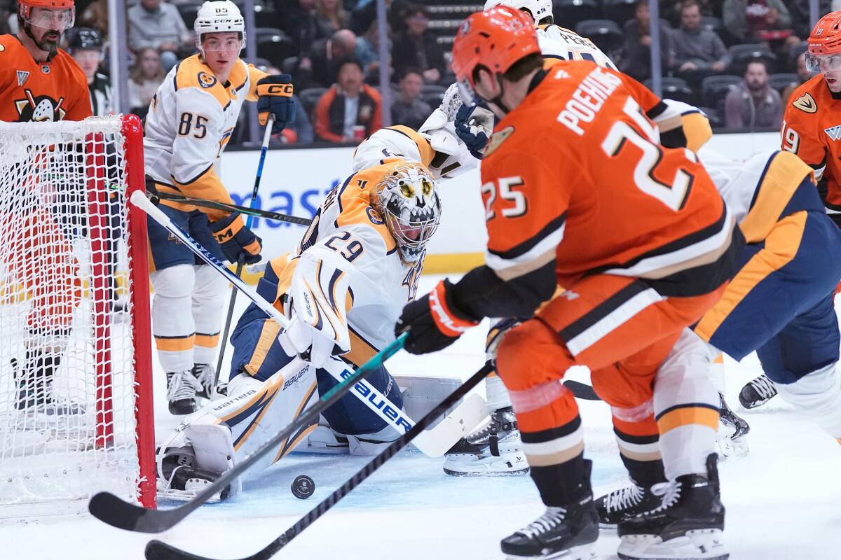 Nashville Predators' goaltender Justus Annunen (29) saves a shot by Anaheim Ducks.
