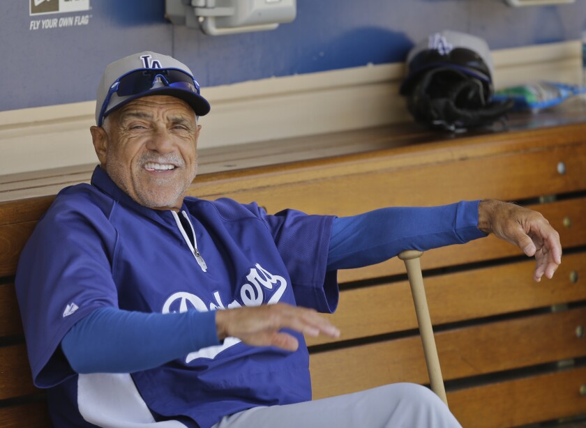 Los Angeles Dodgers coach and legend Davey Lopes relaxes in the dugout prior to warm ups against the Padres in San Diego, California, on  Tuesday, April 9, 2013. 