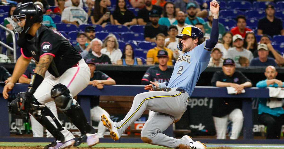 Brewers beat Marlins in extras, Mitchell's double the difference