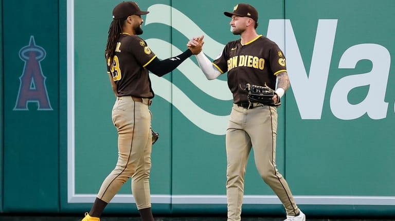 San Diego Padres center fielder Jackson Merrill (3) is greeted...