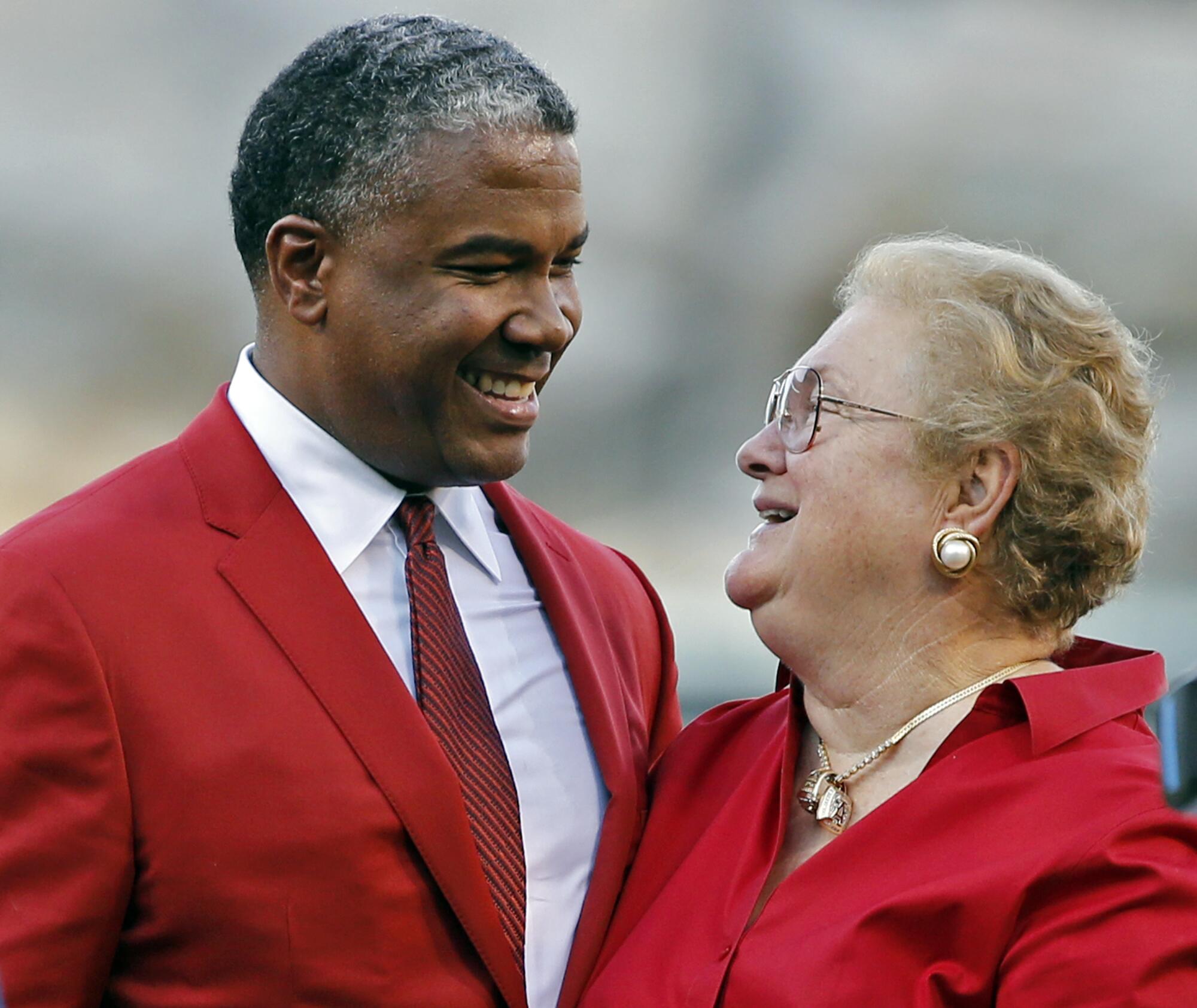 Garret Anderson, left, talks with Jackie Autry, widow of Angels team owner Gene Autry.