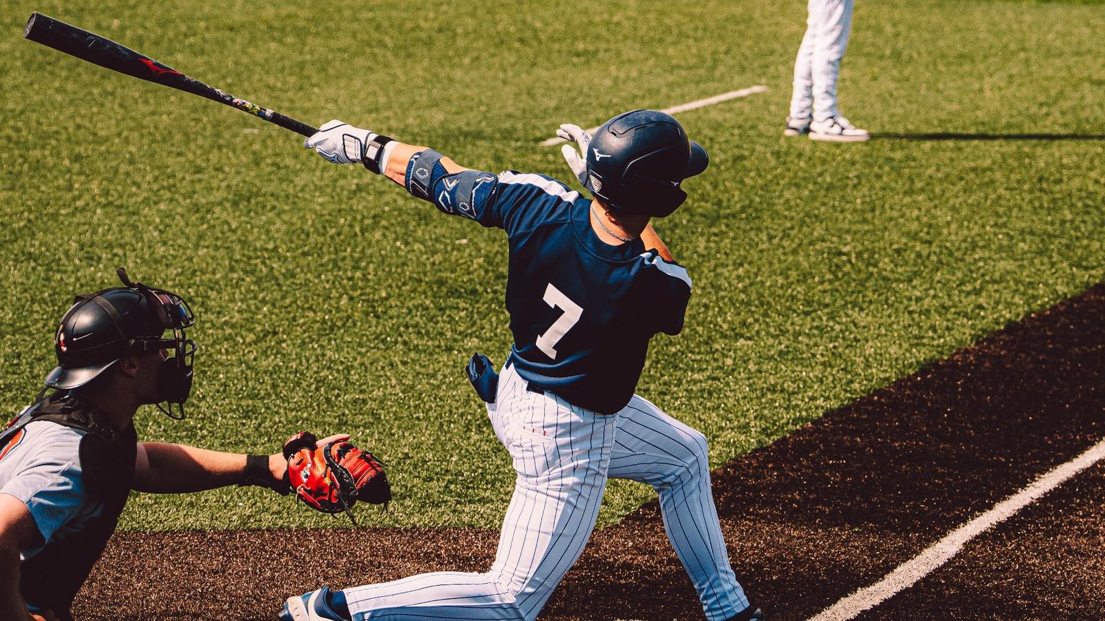 Troy Sudbrook watches a ball he just hit