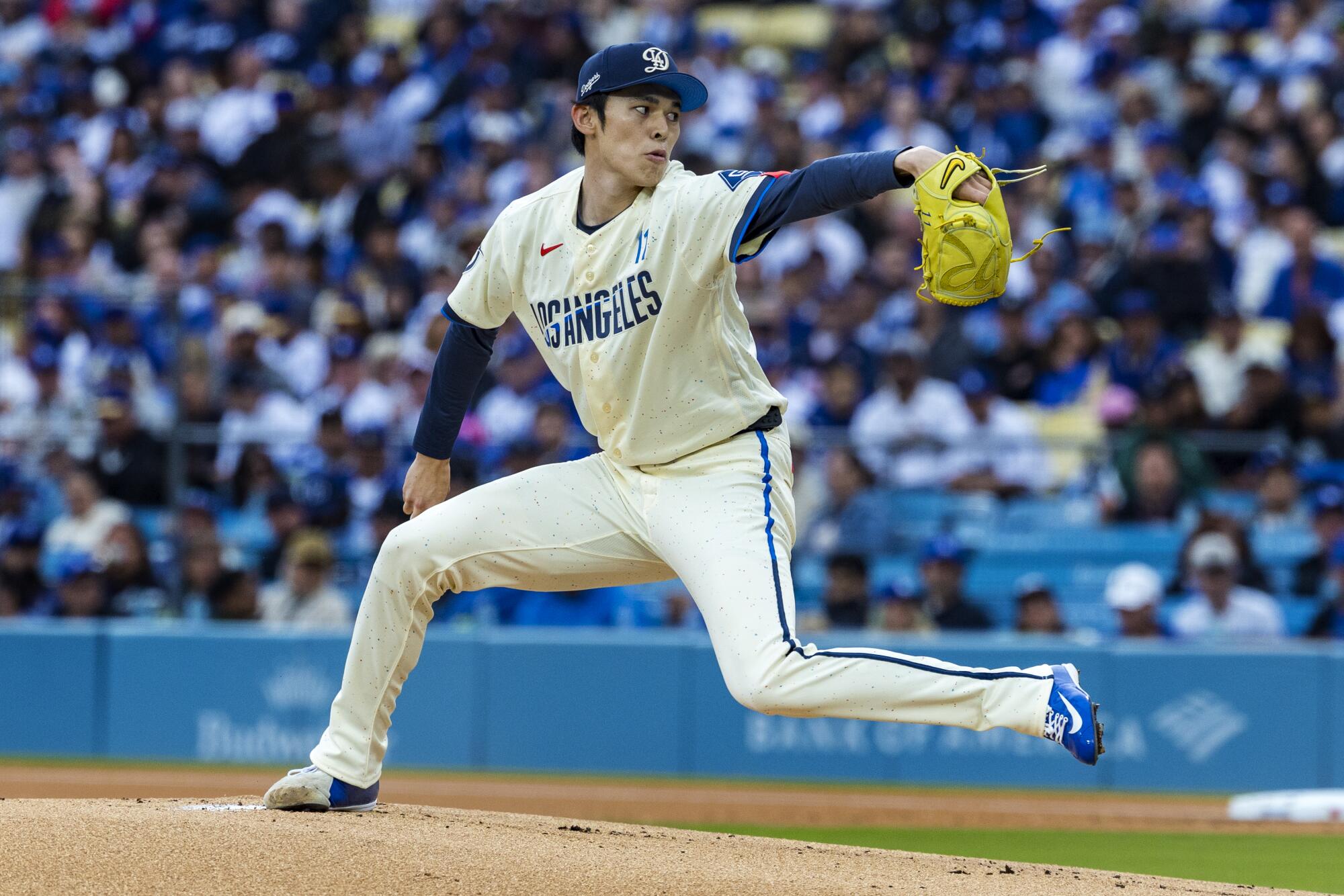 Dodgers starting pitcher Roki Sasaki delivers against the Cubs in the first inning Saturday at Dodger Stadium.