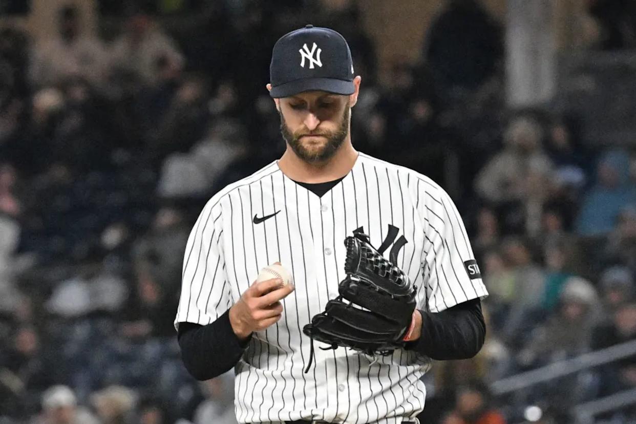 An image collage containing 1 images, Image 1 shows New York Yankees pitcher Jake Bird looking down at a baseball in his glove