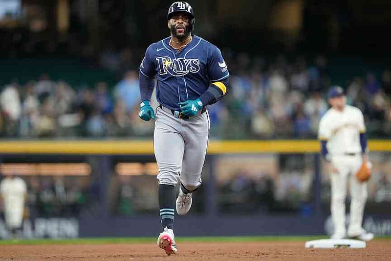 Tampa Bay Rays' Yandy Díaz runs the bases after hitting a two-run home run during the third inning of a baseball game against the Milwaukee Brewers, Wednesday, April 1, 2026, in Milwaukee. (AP Photo/Kayla Wolf)