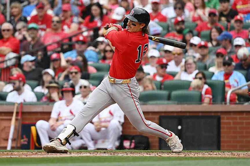 Boston Red Sox's Jarren Duran hits a three-RBI double in the fourth inning of a baseball game against the St. Louis Cardinals, Sunday, April 12, 2026, in St. Louis. (AP Photo/Michael Thomas)