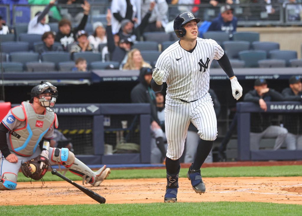 New York Yankees first baseman Ben Rice (22) hits a three-run homer.