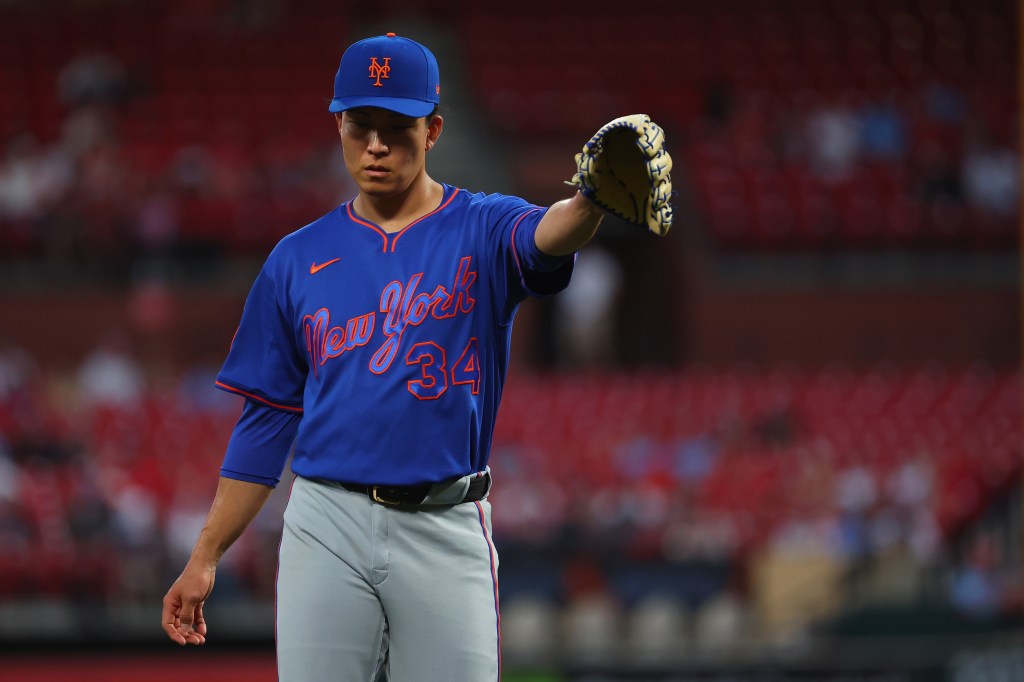 Kodai Senga #34 of the New York Mets posts to his catcher as he returns to the dugout against the St. Louis Cardinals in the first inning at Busch Stadium on March 31, 2026 in St Louis, Missouri. 