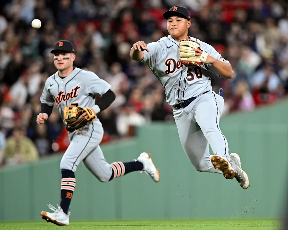 Hao-Yu Lee throws to first base during the seventh inning of his MLB debut for the Detroit Tigers against the Boston Red Sox at Fenway Park on Friday, April 17, 2026 in Boston.