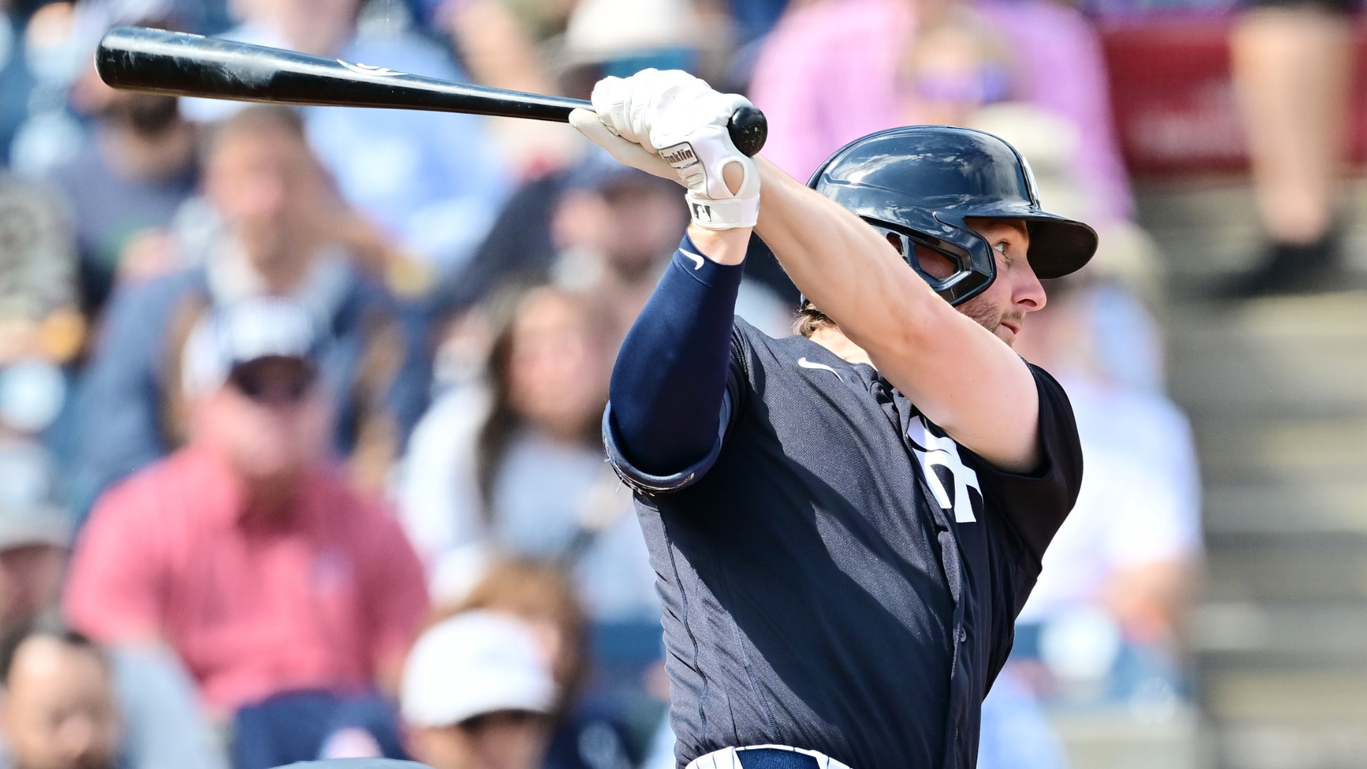 Ryan McMahon #19 of the New York Yankees hits a two-RBI double in the first inning against the Atlanta Braves during a Grapefruit League spring training game at George M. Steinbrenner Field on February 26, 2026 in Tampa, Florida. (Photo by Julio Aguilar/Getty Images)