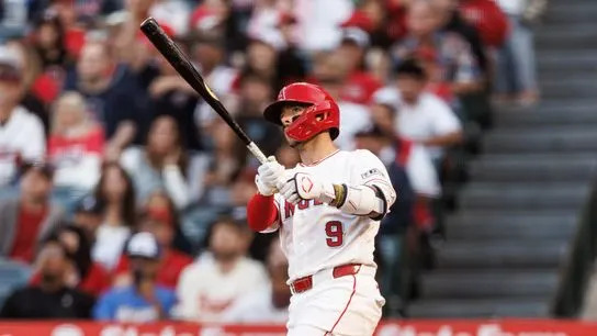 Los Angeles Angels shortstop Zach Neto (9) hits a home run during an MLB game against the Atlanta Braves, Monday April 6, 2026, in Los Angeles, Calif.