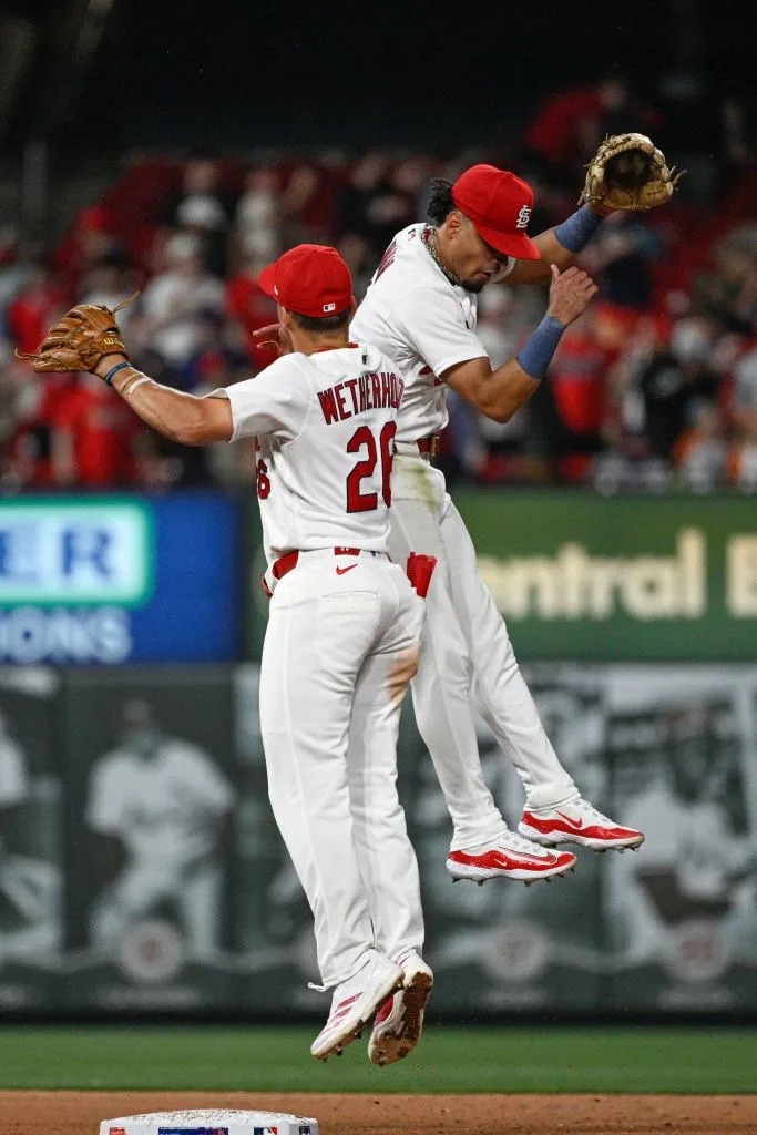 St. Louis Cardinals second baseman JJ Wetherholt, left, celebrates with teammate Masyn Winn, right, after beating the New York Mets in a baseball game, Tuesday, March 31, 2026, in St. Louis. AP