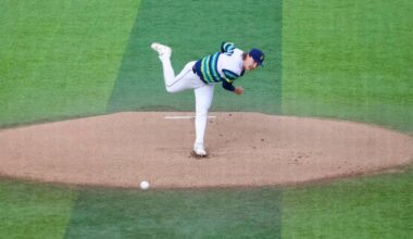 Mariners pitcher Bryce Miller lets out a yell on his delivery during his rehab assignment with the Everett AquaSox at Everett Memorial Stadium on April 24, 2026. (Joe Pohoryles / The Herald)