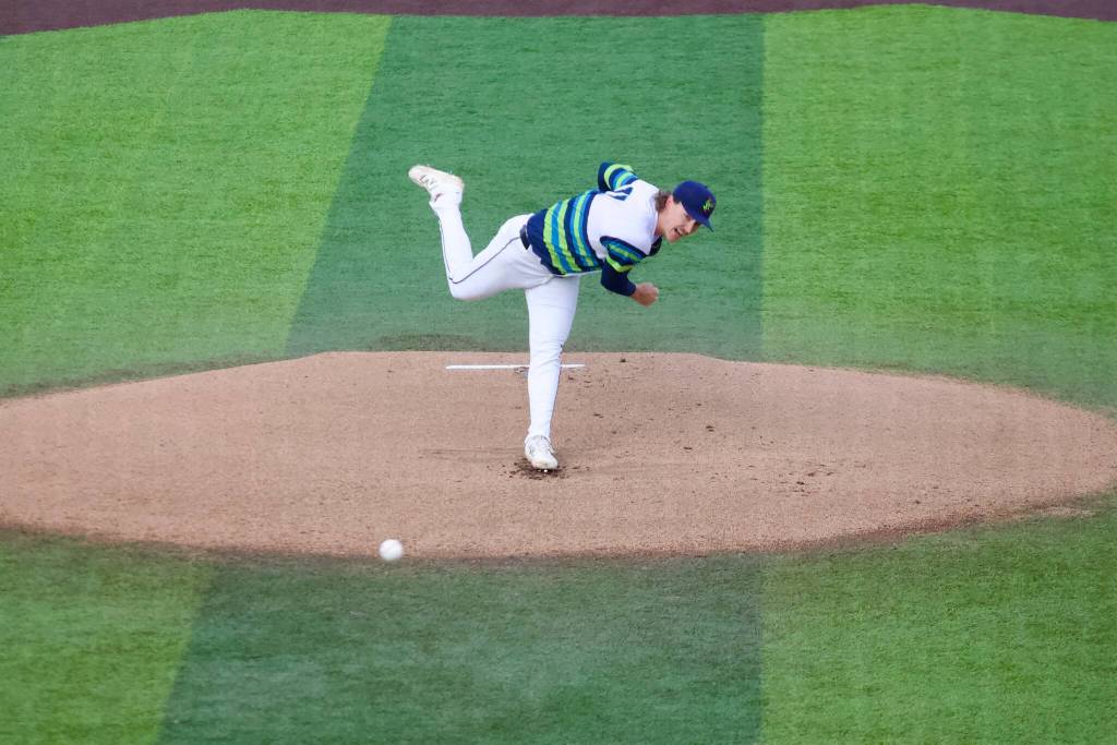 Mariners pitcher Bryce Miller lets out a yell on his delivery during his rehab assignment with the Everett AquaSox at Everett Memorial Stadium on April 24, 2026. (Joe Pohoryles / The Herald)