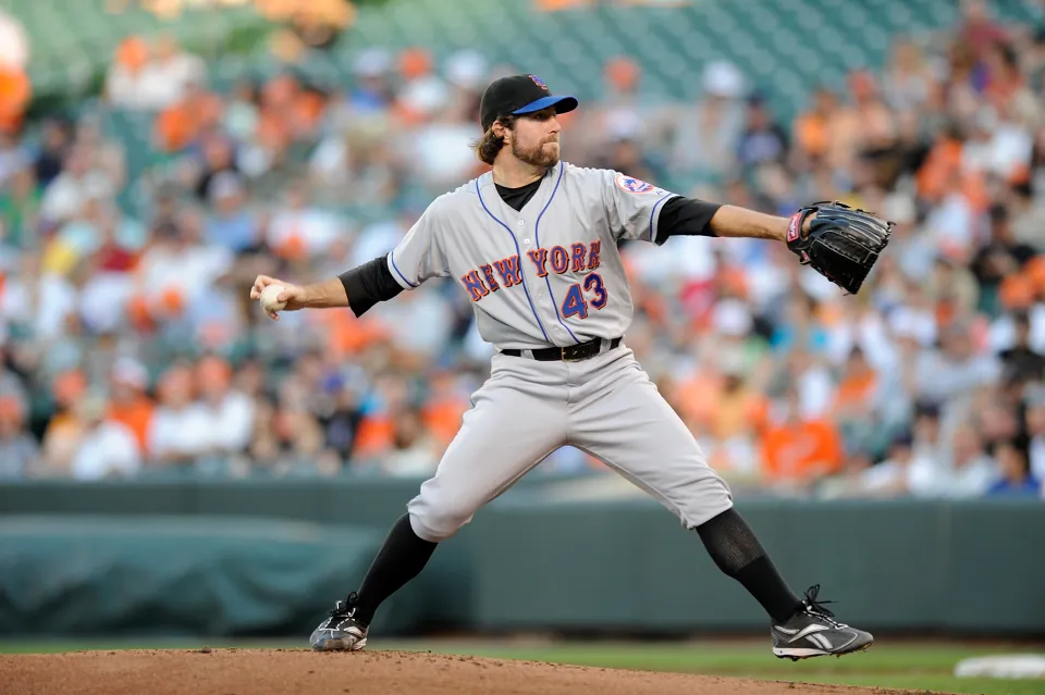 R.A. Dickey #43 of the New York Mets pitches against the Baltimore Orioles at Camden Yards on June 11, 2010 in Baltimore, Maryland.