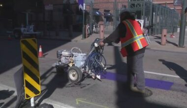 Denver celebrates Rockies home opener with a purple stripe