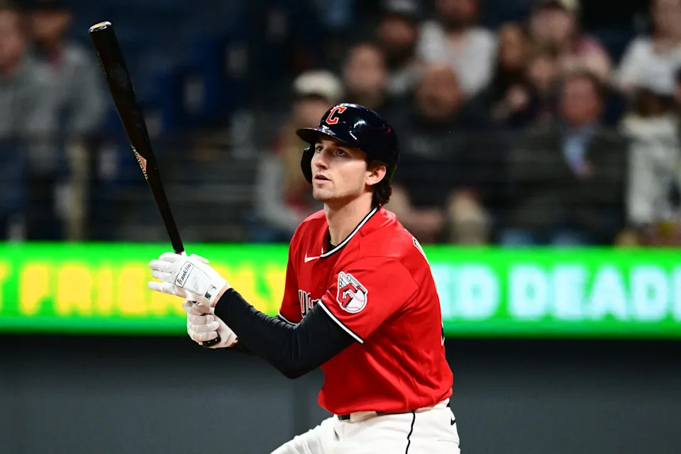 Guardians designated hitter Chase DeLauter hits an RBI triple during the eighth inning against the Houston Astros, April 21, 2026, in Cleveland.