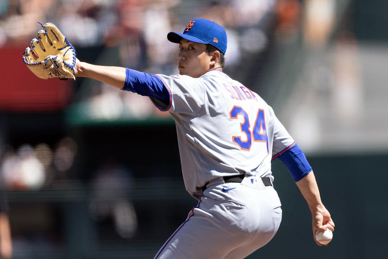 New York Mets starting pitcher Kodai Senga (34) delivers a pitch against the San Francisco Giants during the first inning at Oracle Park.