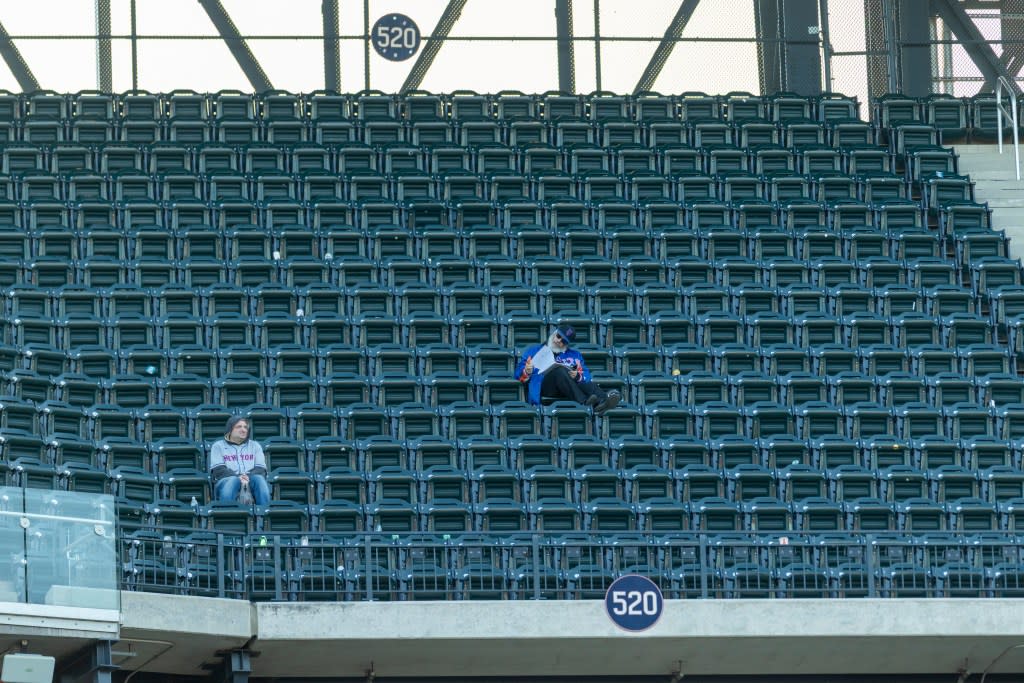 Two fans sit among empty seats during the sixth inning against the Colorado Rockies at Citi Field, Sunday, April 26, 2026. Corey Sipkin for the NY POST