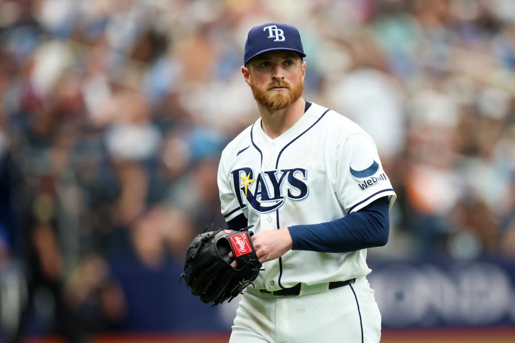 Rays starting pitcher Drew Rasmussen (57) walks off the field after pitching against the New York Yankees in the third inning at Tropicana Field. Nathan Ray Seebeck-Imagn Images