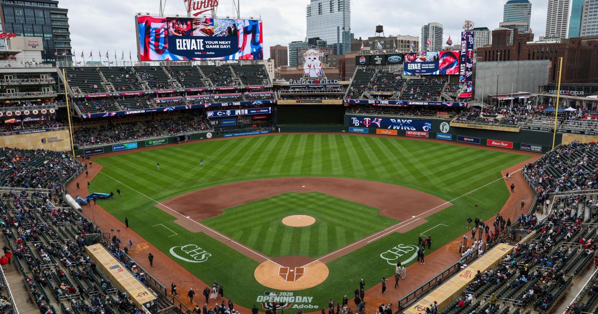 Twins endure a pregame power outage on a cold, rainy day to make for a happy home opener |