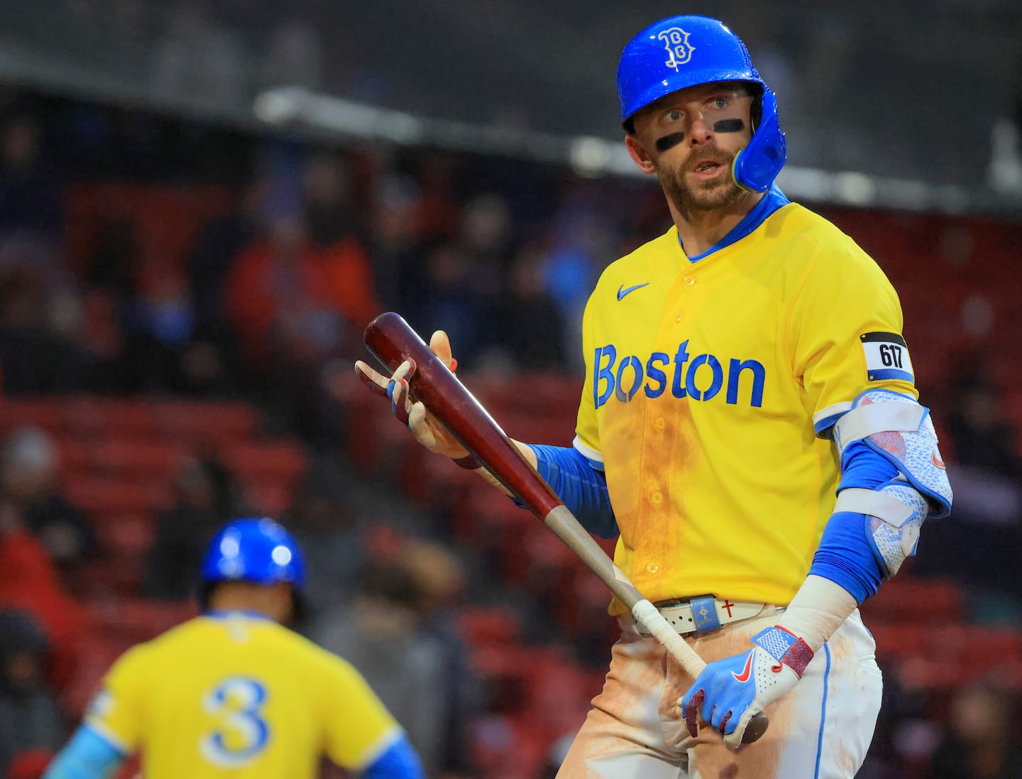 Trevor Story walked back to the dugout after striking out swinging to start the ninth inning.