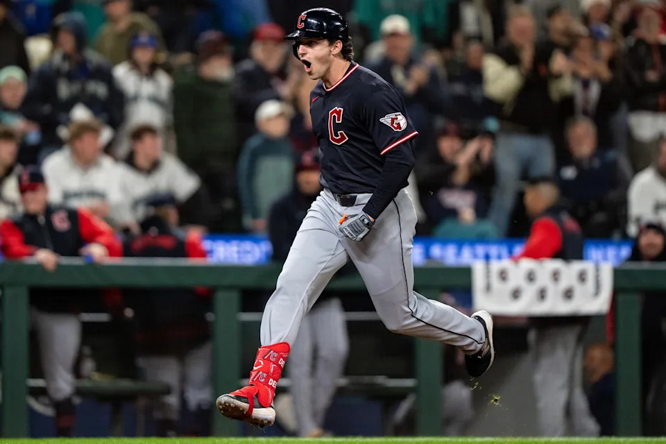 Mar 28, 2026; Seattle, Washington, USA; Cleveland Guardians designated hitter Chase DeLauter (24) celebrates while rounding the bases after hitting a two-run home run during the tenth inning against the Seattle Mariners at T-Mobile Park. Mandatory Credit: Stephen Brashear-Imagn Images
