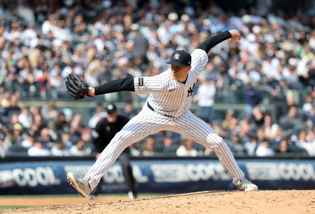 Yankees pitcher Tim Hill (41) throws a pitch during the sixth inning. Charles Wenzelberg/New York Post