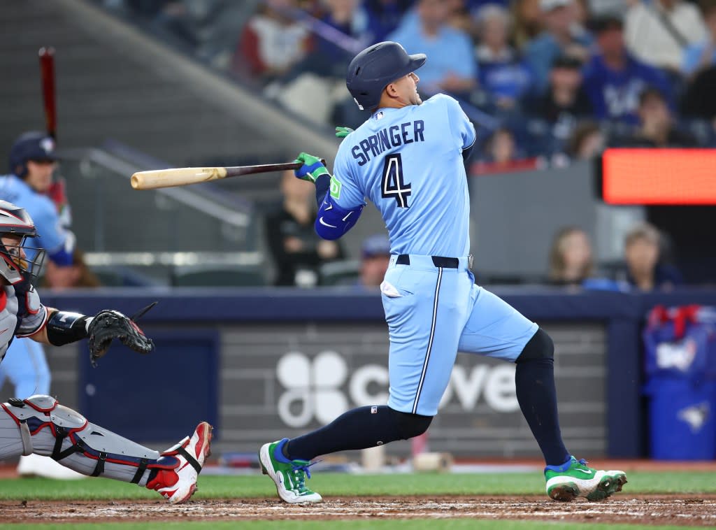 George Springer of the Toronto Blue Jays fouls the ball off his foot in the third inning of a game against the Minnesota Twins at Rogers Centre on April 11, 2026 in Toronto, Ontario, Canada. Springer left the game with a left big toe fracture. Getty Images
