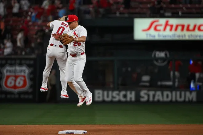Mar 31, 2026; St. Louis, Missouri, USA; St. Louis Cardinals shortstop Masyn Winn (0) and second baseman JJ Wetherholt (26) celebrate after the Cardinals defeated the New York Mets at Busch Stadium.