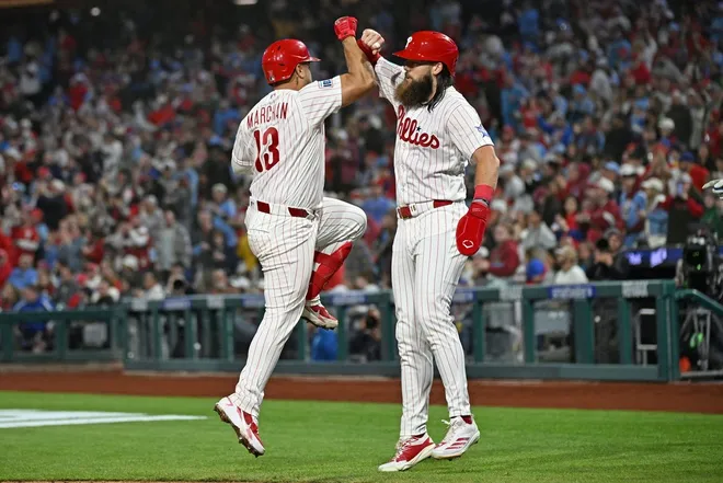 Mar 30, 2026; Philadelphia, Pennsylvania, USA; Philadelphia Phillies catcher Rafael Marchán (13) celebrates his two run home run with center fielder Brandon Marsh (16) against the Washington Nationals during the fifth inning at Citizens Bank Park.