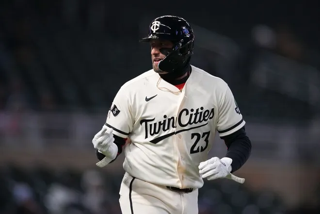 Apr 7, 2026; Minneapolis, Minnesota, USA; Minnesota Twins third baseman Royce Lewis (23) reacts after being walked during the eighth inning against the Detroit Tigers at Target Field.